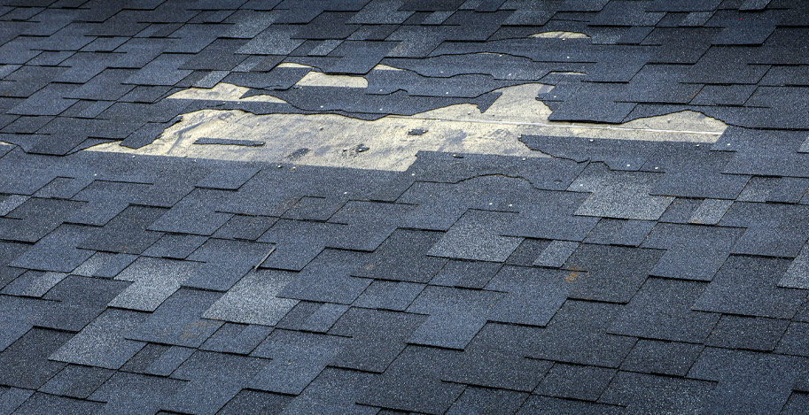 Missing-shingles-residential-home-after-wind-damage