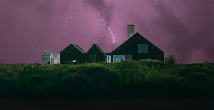 House in storm in the middle of the night