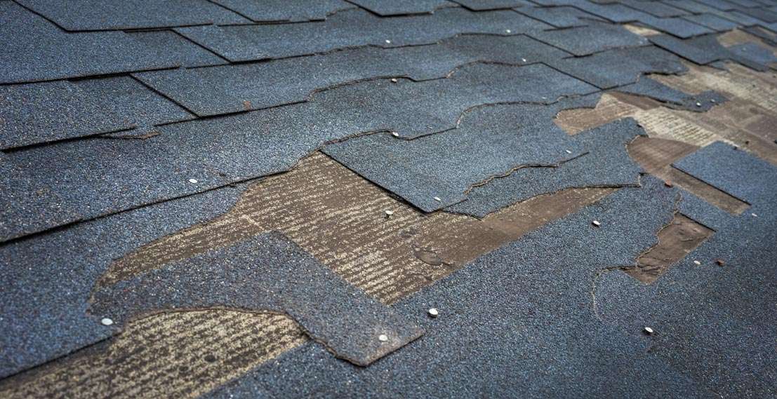Missing shingles on roof after storm