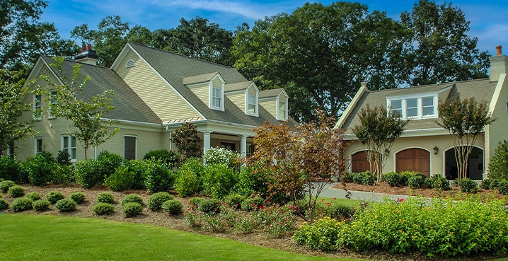 Two story home w/ three car garage for residential roof repairs